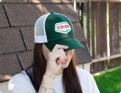 Person wearing a Co-op's vintage cap